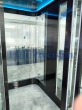Curved Glass Panoramic Elevator for Showroom | FUJI Precision