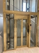 Glass Elevator Design with a Refined Finish