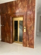 Newly installed elevator from the UAE, elevator titanium gold grain stainless steel, glass door