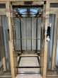 Glass Elevator Design with a Refined Finish